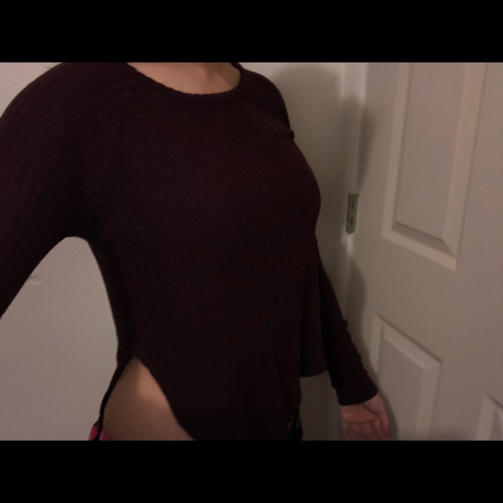 Cropped on the side, burgundy long sleeve shirt